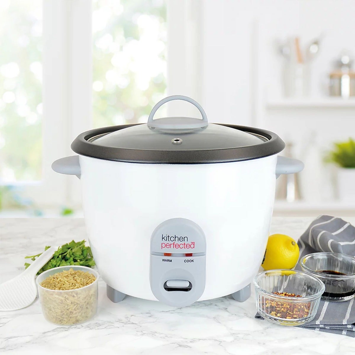 Kitchen Perfected 700W 1.8 Litre Automatic Rice Cooker with Keep Warm Function Non Stick Bowl and Measuring Cup White

