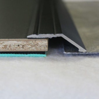 Trojan A47 Self-Adhesive Reducer 15mm Black – Smooth Aluminium Floor Transition Strip